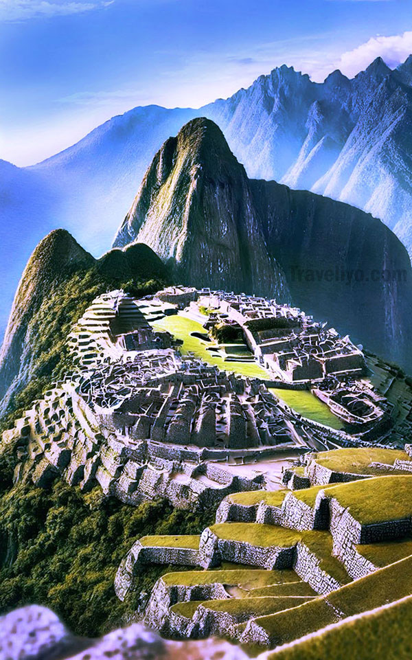 Machu Picchu ruins with Andes mountains