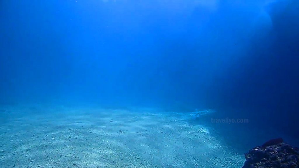 Stunning deep-blue underwater scene inside Blue Cave Vanuatu