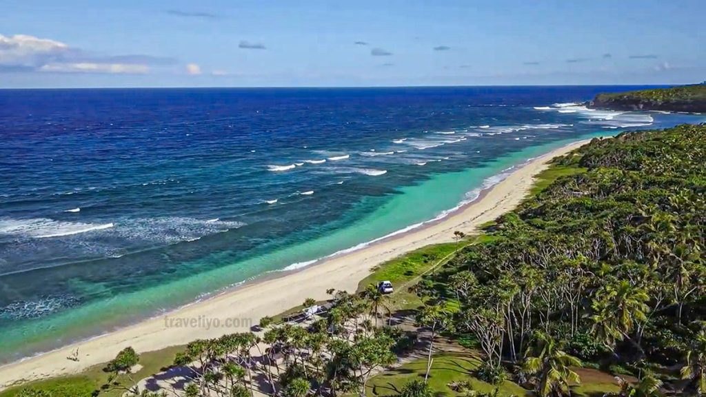 White sand beach on Tanna Island, Vanuatu with turquoise waves