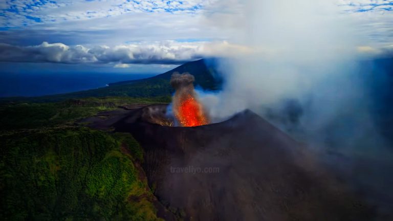 Tanna Vanuatu volcano erupting with smoke and lava at sunrise