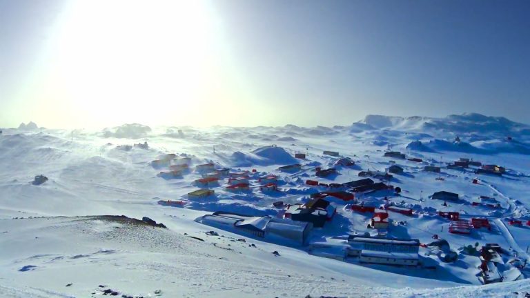 King George Island Antarctica research station buildings surrounded by snow
