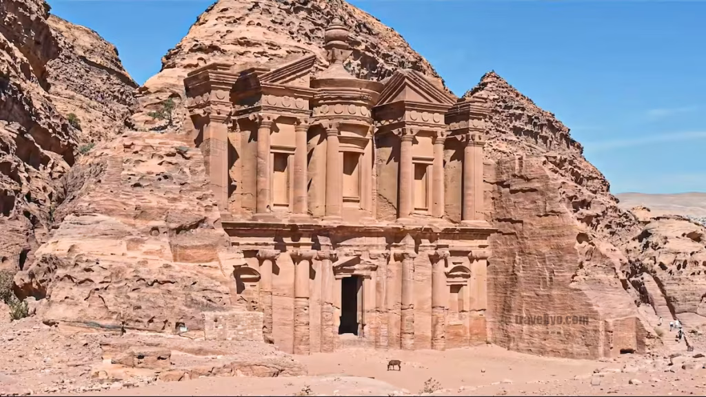 The massive and pristine facade of The Monastery, Ad-Deir, carved into the mountain at Petra.