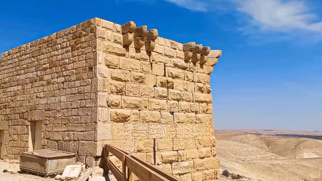 A close-up view of a beautifully restored stone tower corner at Shobak Castle in Jordan.