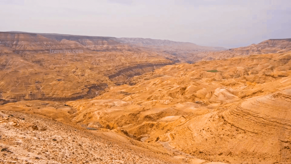 The vast, deeply eroded, and rocky mountain landscape of the grand canyon jordan.