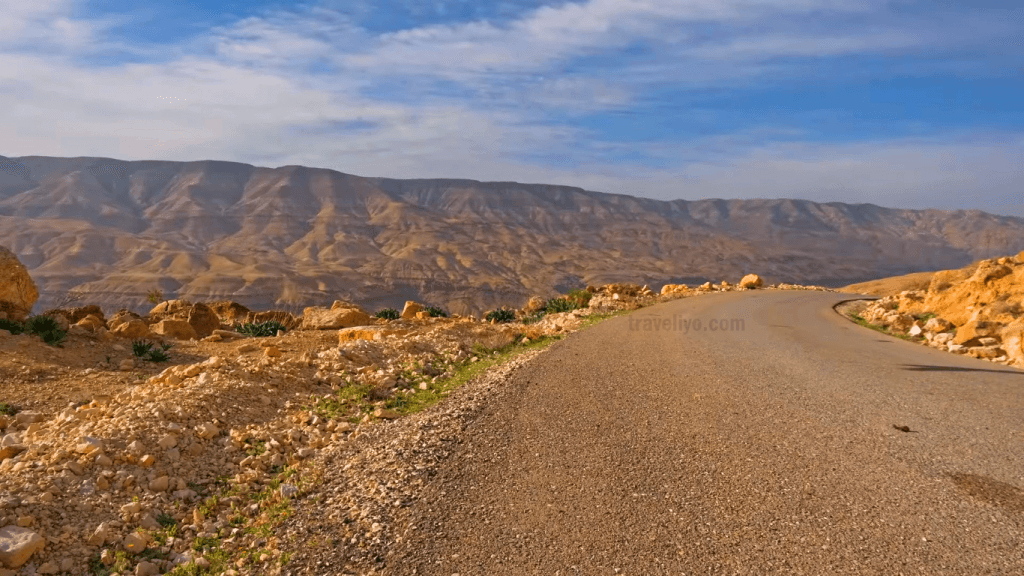 Close-up of the asphalt road on Route 35 leading into the Jordan grand canyon.
