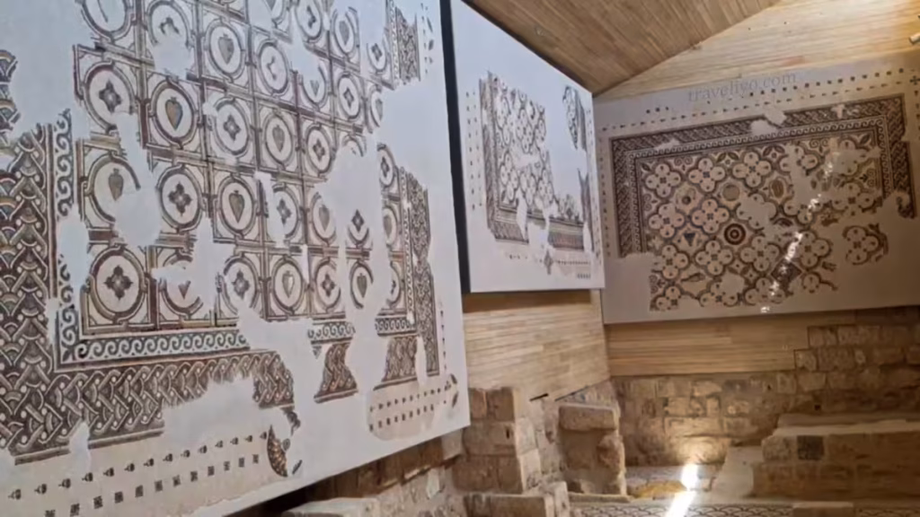 Historic mosaic art panels mounted on the walls of the church at Mount Nebo Madaba.