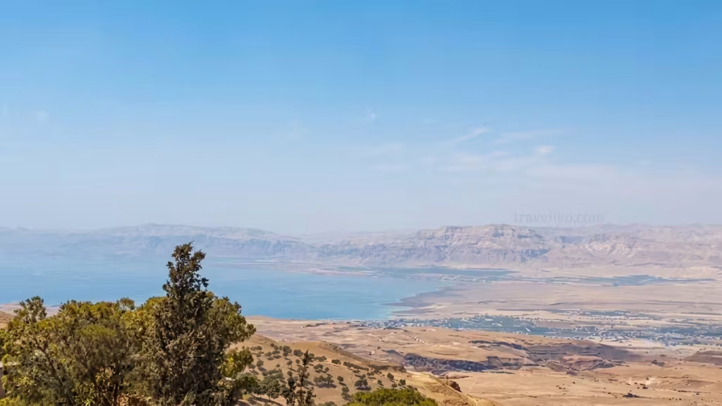 A panoramic Mount Nebo view overlooking the Dead Sea and the distant West Bank mountains.