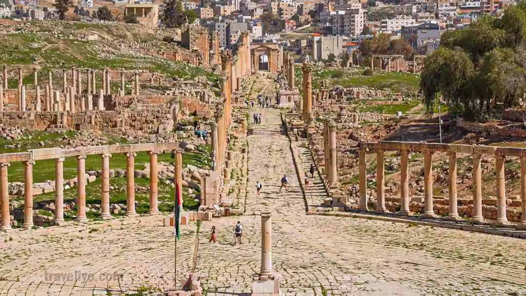 High angle view looking down Cardo Maximus colonnaded street towards Oval Plaza in Jerash Jordan