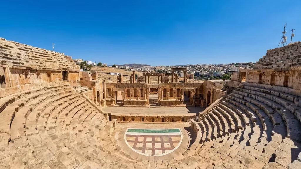 Elevated view of the stage wall and seating at South Theater in Jerash Jordan ruins